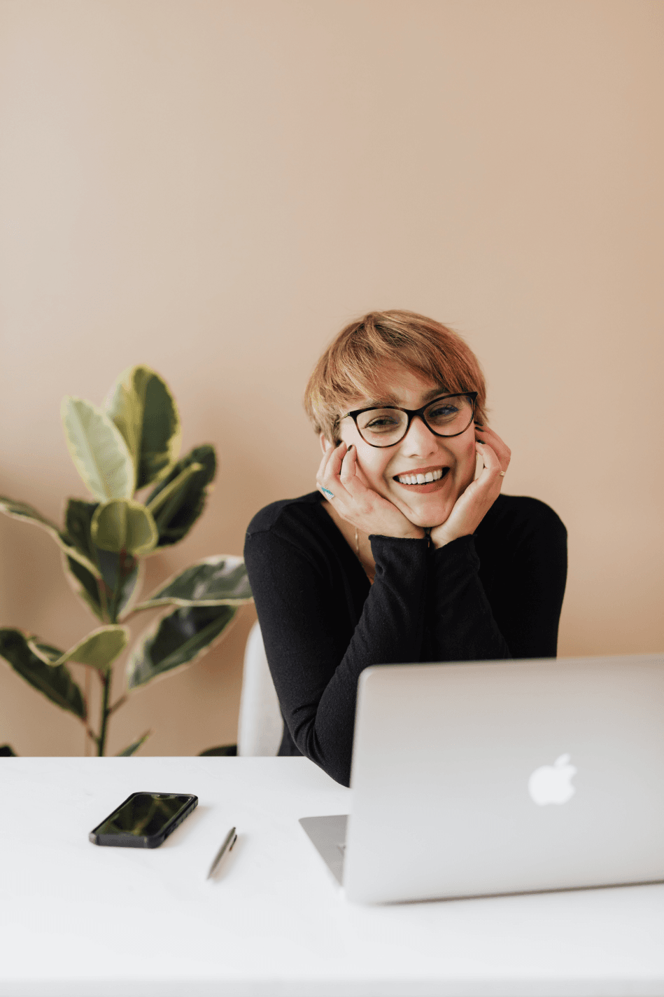Woman smiling about achieving financial freedom