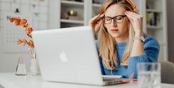 stressed employee working on computer